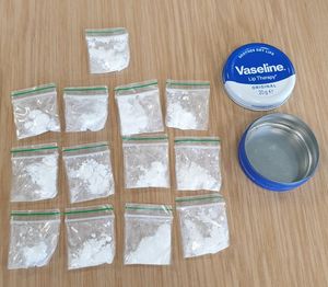 A number of cocaine bags were found in a Vaseline tin. 