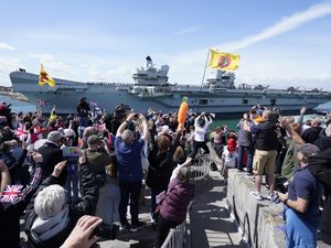 People waving off the HMS Prince of Wales