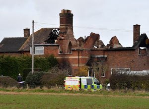 Police at the scene of the house fire in Moortown, High Ercall in March 2023