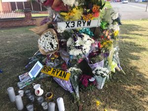 Tributes at the scene of the crash in Upper Gornal