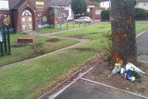 Flowers left at the scene of the crash in Thimblemill Road, Smethwick, where Richie Neilson was killed