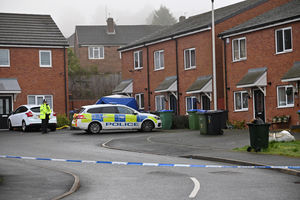 Police at the house the day after Shay's death