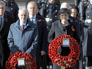 Supporting image for story: Peter Rhodes on a scruffy coat, a president scared of the rain and more curious pop-up adverts