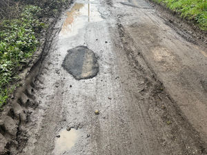 Supporting image for story: I thought farming was hard enough work - then I met Shropshire villagers struggling with potholes on 'undriveable rural roads'