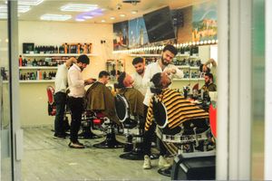 WALSALL COPYRIGHT SHROPSHIRE STAR STEVE LEATH 27/09/2023..Pic in Walsall in the square, just outside the Art Gallery, where its your last chance to catch an exterior national exhibition of street photography, some including Walsall and the Black Country. The project is touring the country and 3 pics chosen to represent Walsall included this one: The Barbershop Quartet by Anu Gamanagari. One of the judges was a memeber of the Art gallery staff..