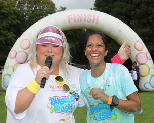 Jasprit Chagger (right) enjoying the Acorns Bubble Rush.