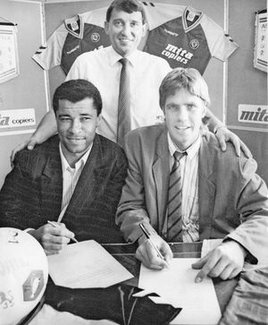July 1989. Villa boss Graham Taylor is pictured with his new defensive giants Paul McGrath (left) and Kent Neilsen