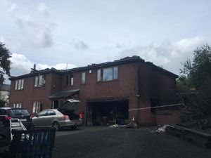 Supporting image for story: Family flees to safety