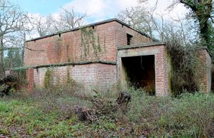 A former World War Two blast-proof building and the 55 acres of woodland it sits on have been put on the market with a guide price of a £2m.