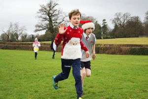Marches students take part in a festive fun run