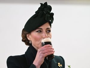 The Princess of Wales enjoys a glass of Guinness during a visit to the Irish Guards for their St Patrick’s Day parade at Wellington Barracks