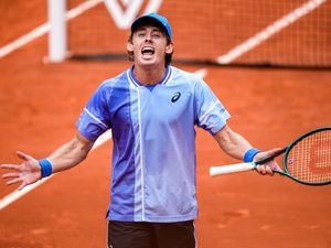 Supporting image for story: Alex De Minaur roared on by his superfan to beat Daniil Medvedev at French Open