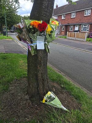 Floral tributes were left at the scene of the knife attack on Wayford Close