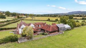 The spacious seven bedroom home in Diddlebury near Craven Arms sits within around an acre of land. Pic: Fine & Country/Rightmove