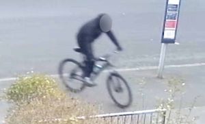 CCTV footage captures the 15 year-old murderer of Leo Ross riding his bike home after the murder.