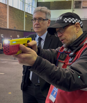 West Midlands PCC Simon Foster seeing the new Axon Taser 10 in action at the Tally Ho! Tactical Training Centre in Birmingham. PIC: West Midlands Police.