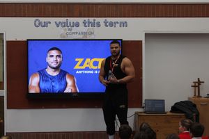 Zack speaking to the school about the benefits of a Positive Mindset