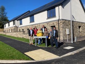 Left to right: Paul Lund, Contracts Manager at SJ Roberts, Matthew Roberts, Construction Director at SJ Roberts, County Councillor Ange Williams, Mike Sambrook Managing Director SJ Roberts, Kate Curran Director of Finance, Governance and Investment at Barcud, County Councillor Corinna Kenyon-Wade and Geraint Roberts Head of Development at Barcud