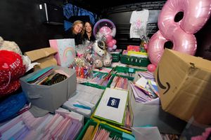 Stacey and Sue Dixon from Party Angels with just some of the donated cards and gifts. Photo: Tim Thursfield