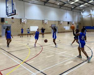 St Peter's U19 Girls' Basketball Team warming-up prior to the semi-final.