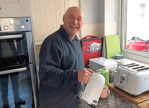 Arthur Benton puts the kettle on