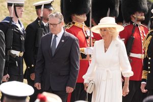Prime Minister Sir Keir Starmer and Queen Camilla during the national Service of Remembrance, hosted by the Royal British Legion in partnership with the Government, to mark the 80th Anniversary of VJ Day at the National Memorial Arboretum in Alrewas, Staffordshire. Picture date: Friday August 15, 2025. PA Photo. Photo credit should read: Aaron Chown/PA Wire 