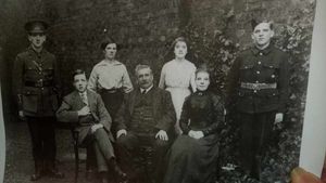 The Phillips family, with Robert, standing on the far left, bother Gus seated in front of him and elder brother Sid who was killed at the Somme, on the far right.