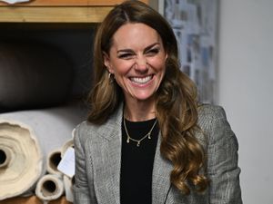 Supporting image for story: Kate wears necklace bearing initials of her three children