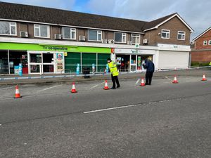 Police have taped off an area outside the shops on Mount Pleasant Road in Shrewsbury.
