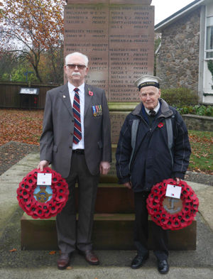 James Mott laying a wreath on behalf of the Royal Air Force and Philip Jennings laying a wreath on behalf of the Royal Navy at Presteigne war memorial. Karen Compton pic
