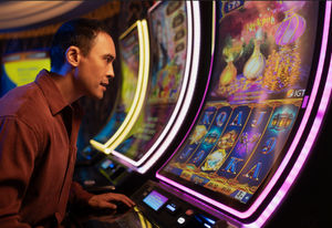 Customer playing slot machines