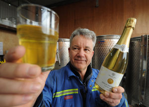 Tony Lovering with his cider in the barn before the fire