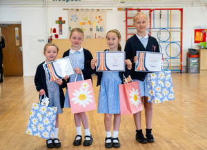 Ella, Phoebe, Violet and Indie with their certificates and prizes.
