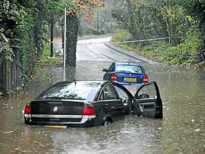 Supporting image for story: Heavy rain causes roads chaos as motorways close
