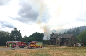 The blaze came close to properties but no-one was injured

