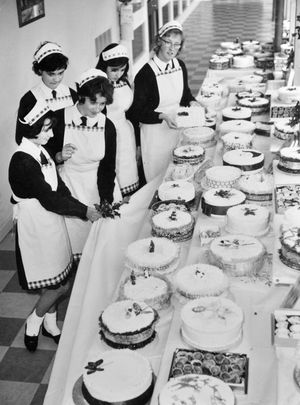 Christmas 1963, Wellington Girls Secondary Modern. Wellington school girls. Looks like a cookery class with cakes. Charlton moving to a new site in 2016. Library code: Wellington nostalgia 2016.