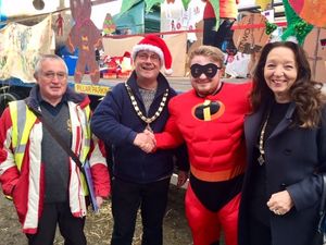 Congratulating one of the fancy dress characters