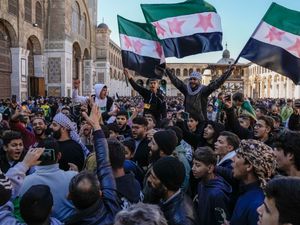 Supporting image for story: Thousands gather in Damascus to celebrate the toppling of Assad regime