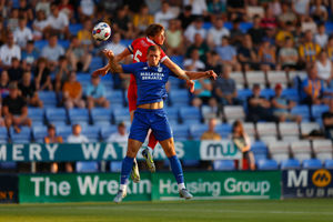 Matthew Pennington Shrewsbury Town competes with Max Watters of Cardiff City (AMA)