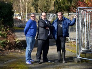 From the Save the Crooked House campaign group are Ian Sandall (left) and Paul Turner (right) with MP Mike Woods.