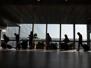 Supporting image for story: Nations across world look to tighten borders as more Omicron cases pop up