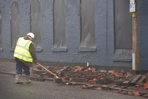 Sandwell Council workers clear the fallen bricks in Cornwall Road