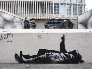 Supporting image for story: Artwork thought to be by Banksy appears at foot of London skyscraper
