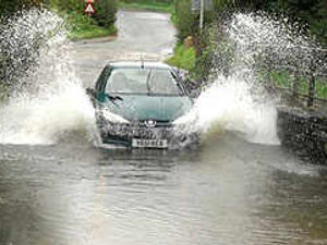 Supporting image for story: Torrential rain leads to flood warning