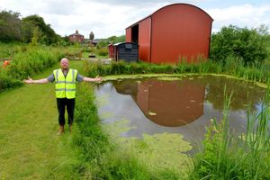 Alan Rawlinson with the barn