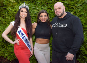 24-year-old Miss Birmingham winner Sacha poses with her bodybuilding fanatic parents Bryn and Alison
