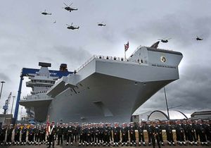 A helicopter flypast at the formal naming ceremony for HMS Queen Elizabeth