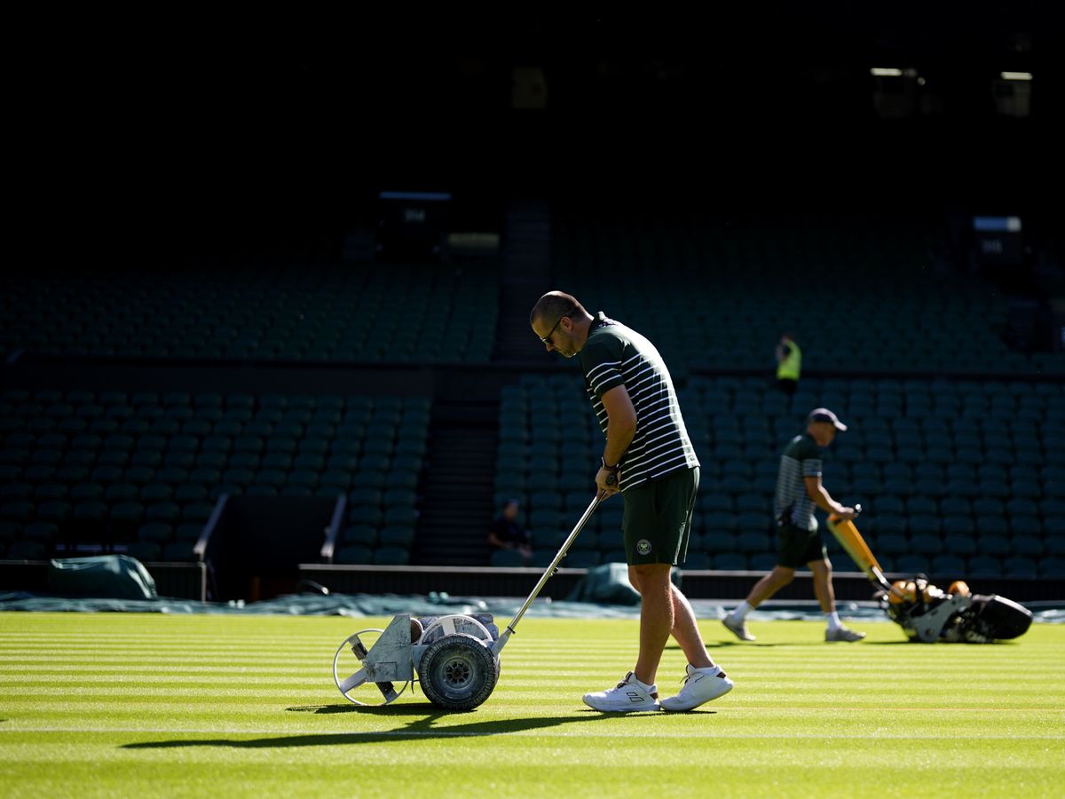 Wimbledon groundsman says Centre Court holding firm amid record heat