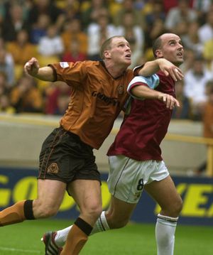 Paul Cook playing against Wolves with Burnley.