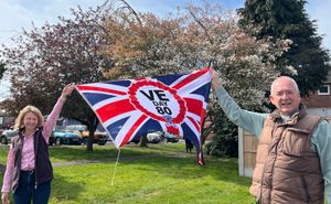 Catherine Rogers of Shifnal Benefice and Rev Chris Thorpe with the special VE 80 flag. 